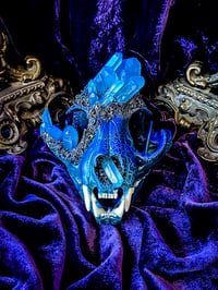 Image 1 of UV Luminescent, Blue Aura Quartz & Carborundum - Bobcat Skull.