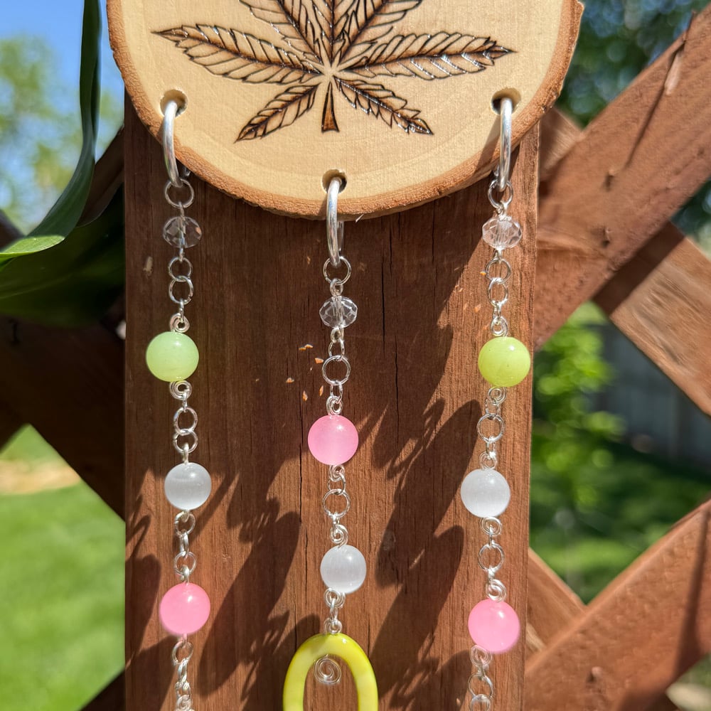 Image of pink terpene sun catcher 