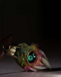 Image 11 of Egg of the King all seeing fangs pendant, leather cord, brass hardware, OOAK