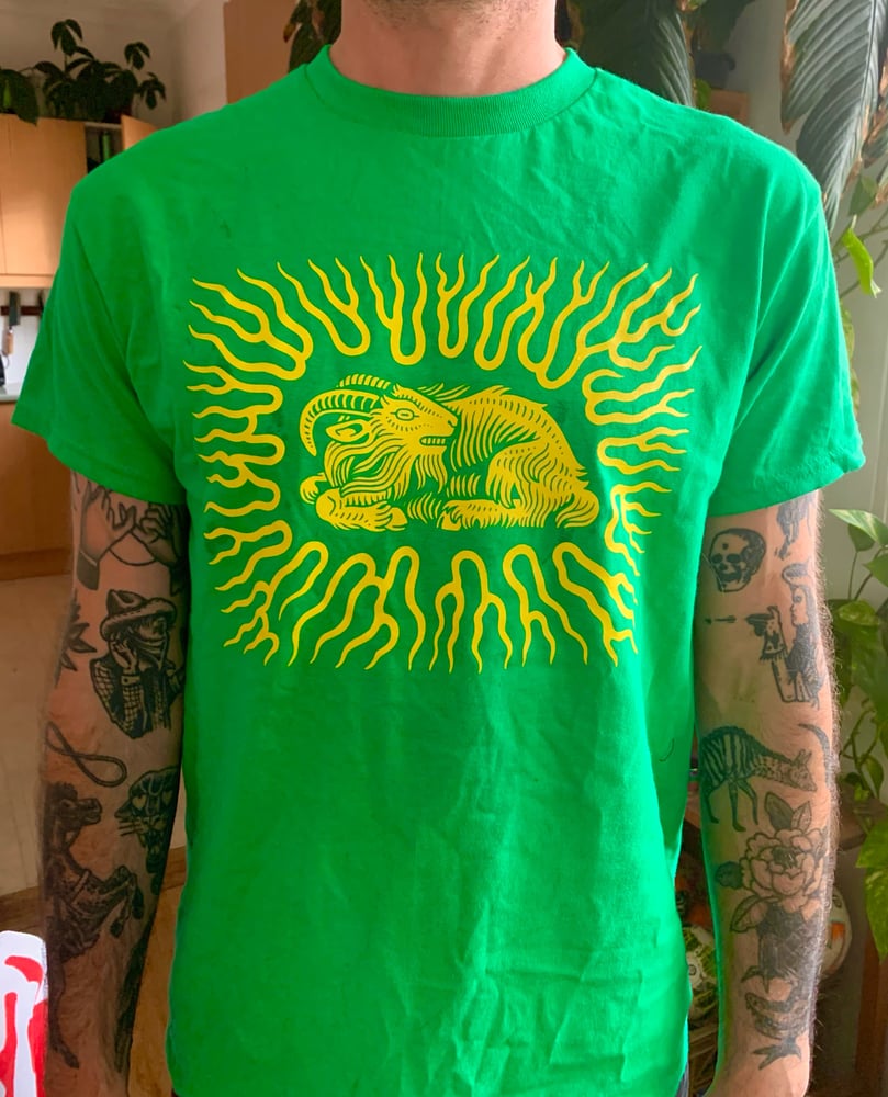 Image of Flaming Goat Yellow on Green