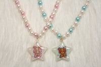 Image 2 of wind-up toy necklace set