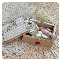 Image 8 of vintage french box full of buttons