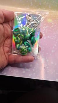 Green octopus d20 keychain