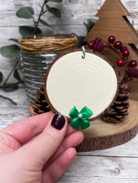 Image 2 of Log slice with bow