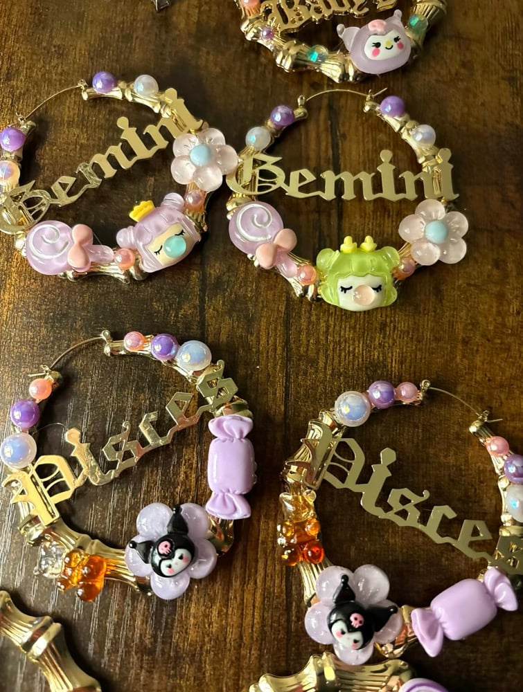 Image of zodiac sign junk earrings