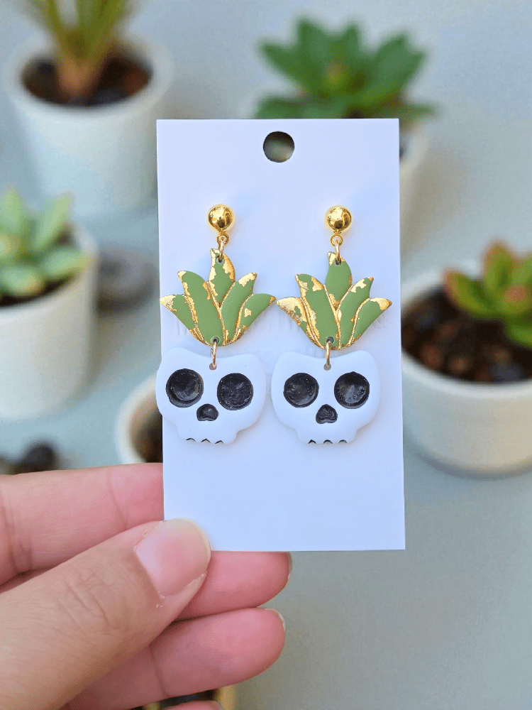 Image of Creep It Growing Glow-in-the-Dark Skull PlanterEarrings