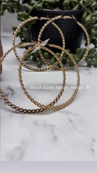 Gold link twist hoops 