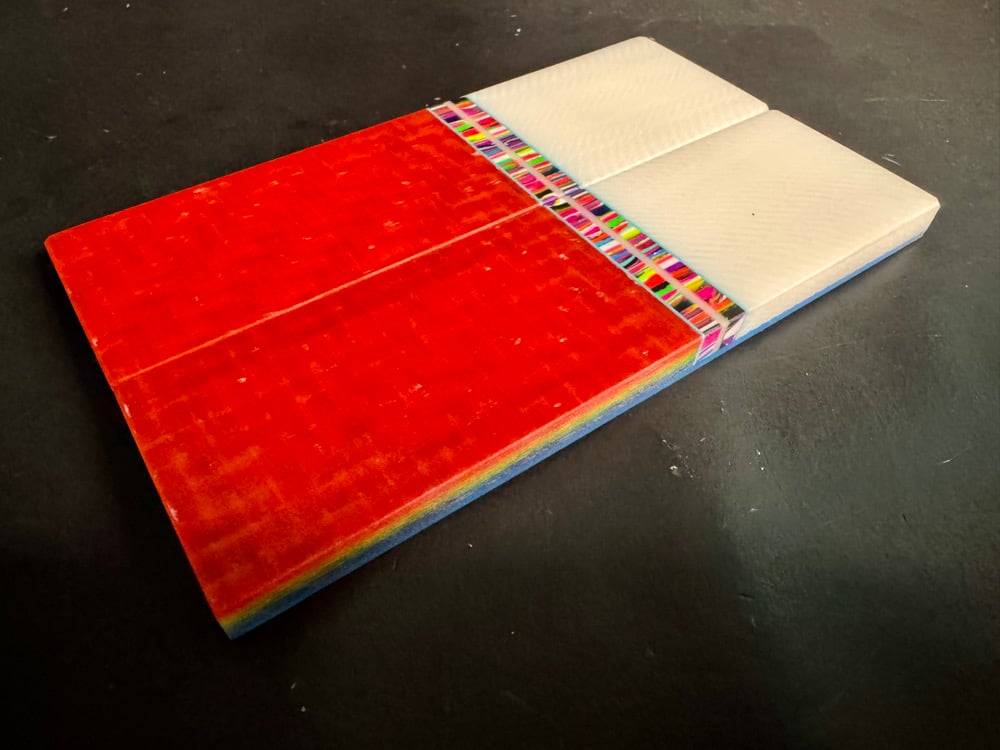 Image of White Faux Ivory & Rainbow Carbon Fiber GLOW Knife Scales