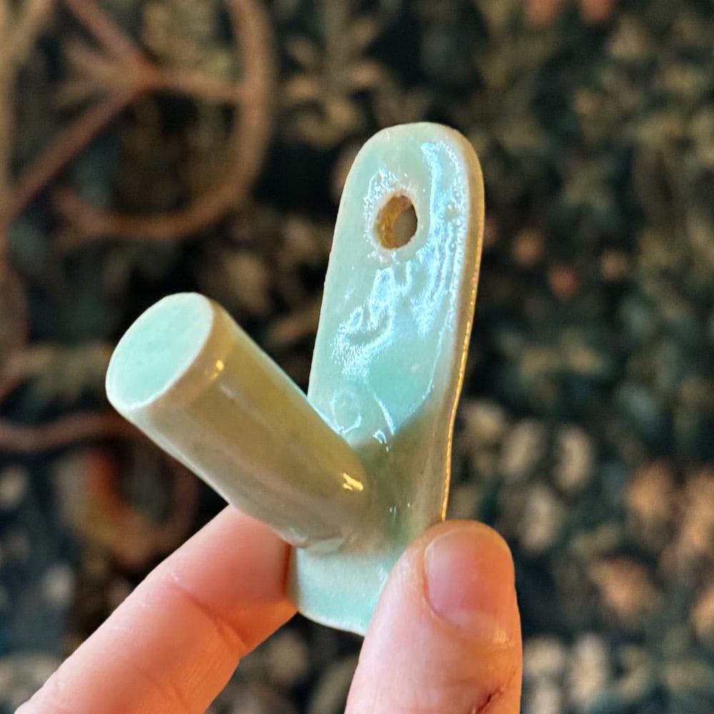 image of single hook wall hangers 