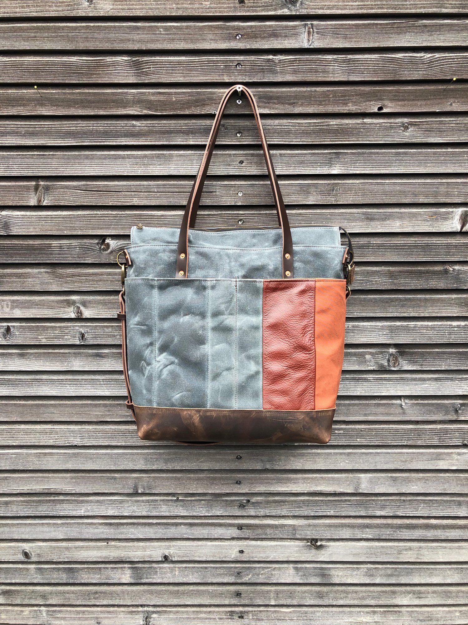 Image of Oversized tote bag in waxed canvas and leather with cross body strap COLLECTION UNISEX