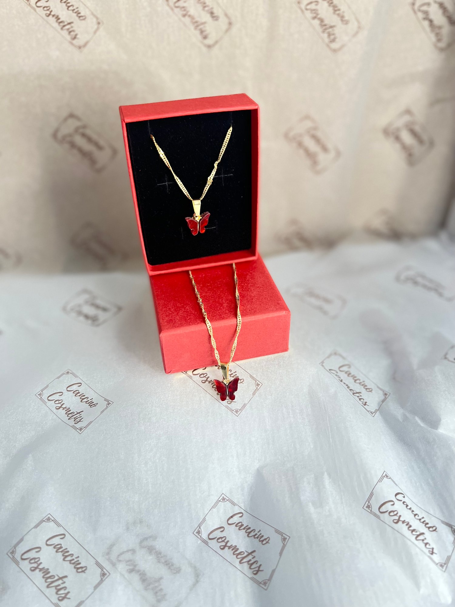 Image of RED BUTTERFLY CHARM NECKLACE