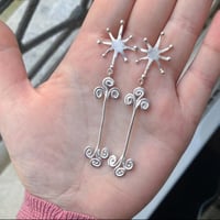 Image 1 of Boucles filantes