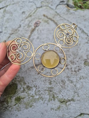 Sun necklace with yellow centre 