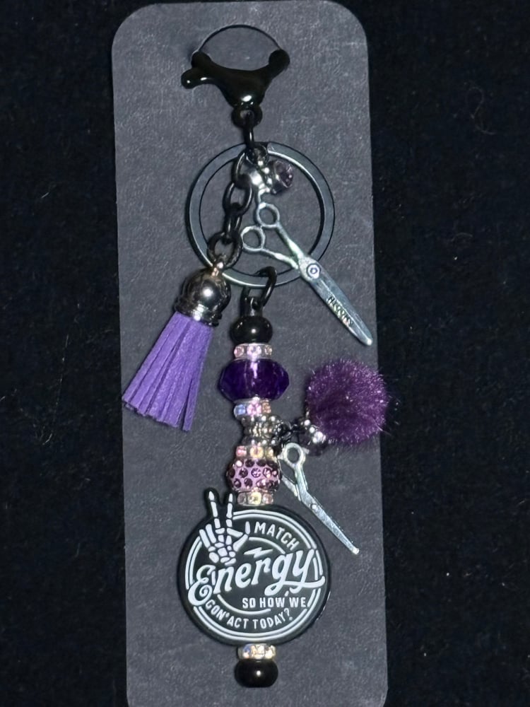 Image of hairstylist inspired black and purple purse clip keychain 