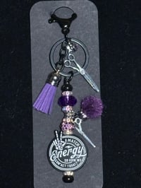 Image 1 of hairstylist inspired black and purple purse clip keychain 