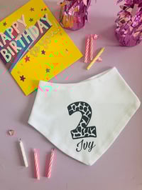 Cow print birthday bib 