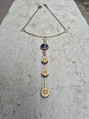 3 bullet casings and black stone necklace  copy