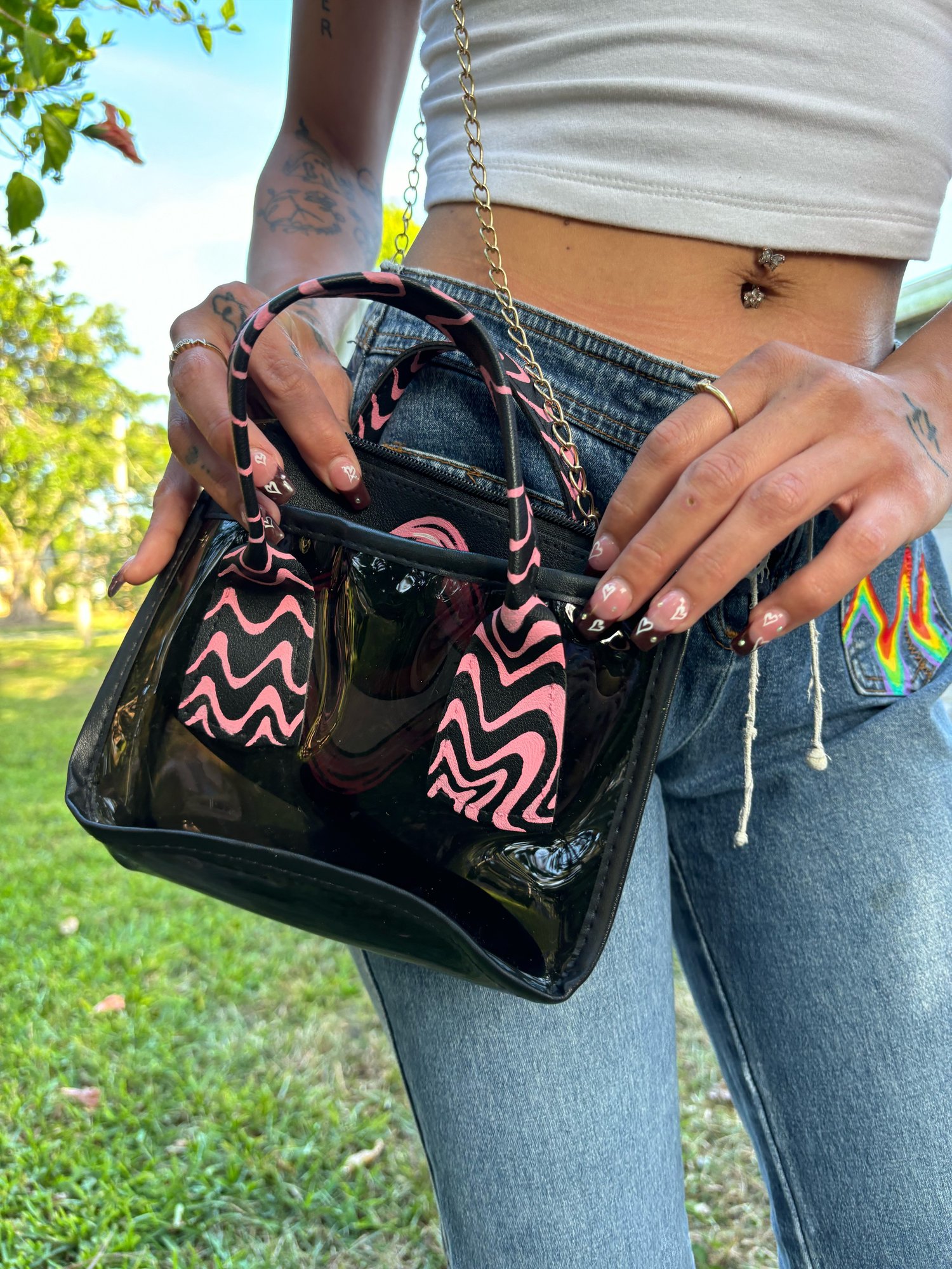 Image of Black and pink swirl purse 