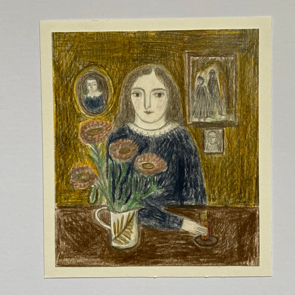 Image of Woman at a table with flowers 