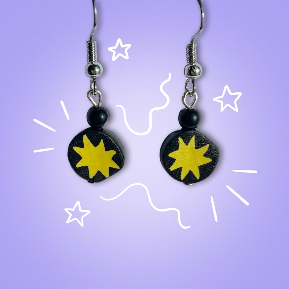 Image of star charm earrings 