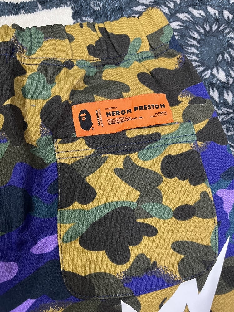 Image of BAPE x Heron Preston Mix 1st Camo Sweatpants