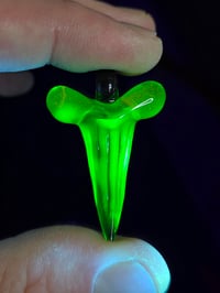 Image 4 of Fully uv reactive crushed opal glass shark tooth pendant. 