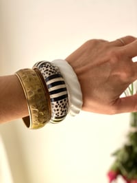 Image 1 of Bracelets manchettes