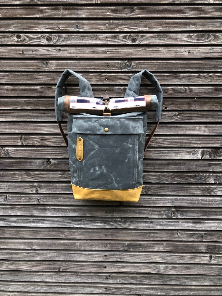 Image of Backpack made with recycled base and roll to close top