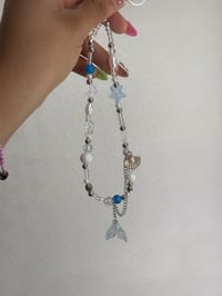 Image 1 of Beach girl phone charm