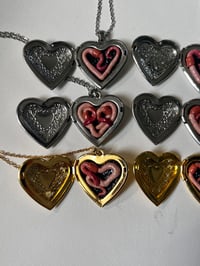 Image 2 of Worm Lockets