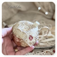 Image 7 of Handmade pin cushion sitting on a silver tray full of French sewing notions