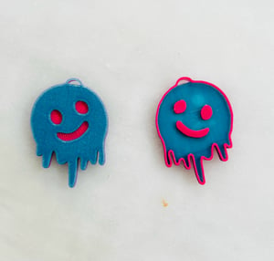 Boucles d’oreilles smiley qui coule recto verso bleu et rose 