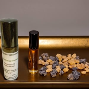 Image of Frankincense & Myrrh essential oil roller bottle