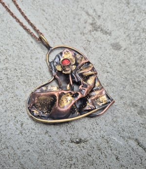 Heart pendant with flower