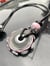 Image of pink gray day; effetre glass medallion with accent beads and leather cord