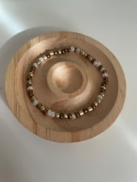 Image 1 of Bronze stacker