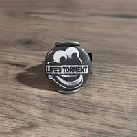 Image 4 of Life’s Torment 1.25” Button