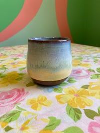 Image 1 of blue and yellow tumbler