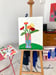 Image of Zinnias on a Green Table