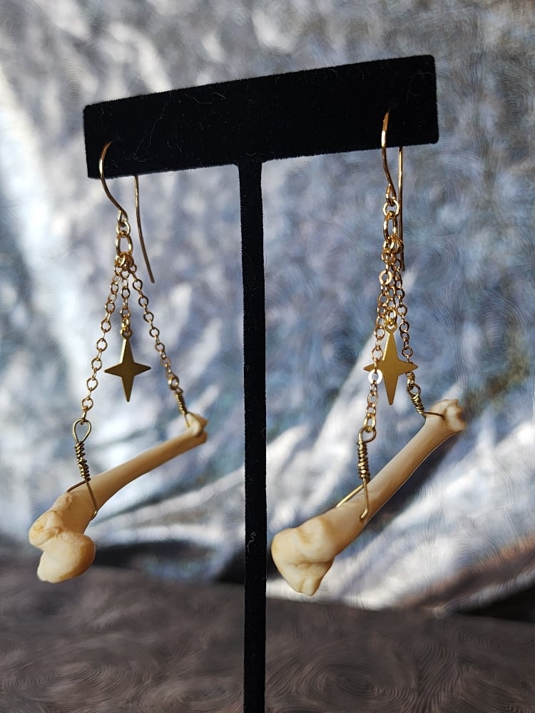 Image of gold rabbit leg earrings