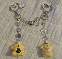 Image 1 of Magnetic hearts matching pompompurin keychain 💛