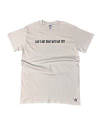 God’s Not Done Tee (Tan)