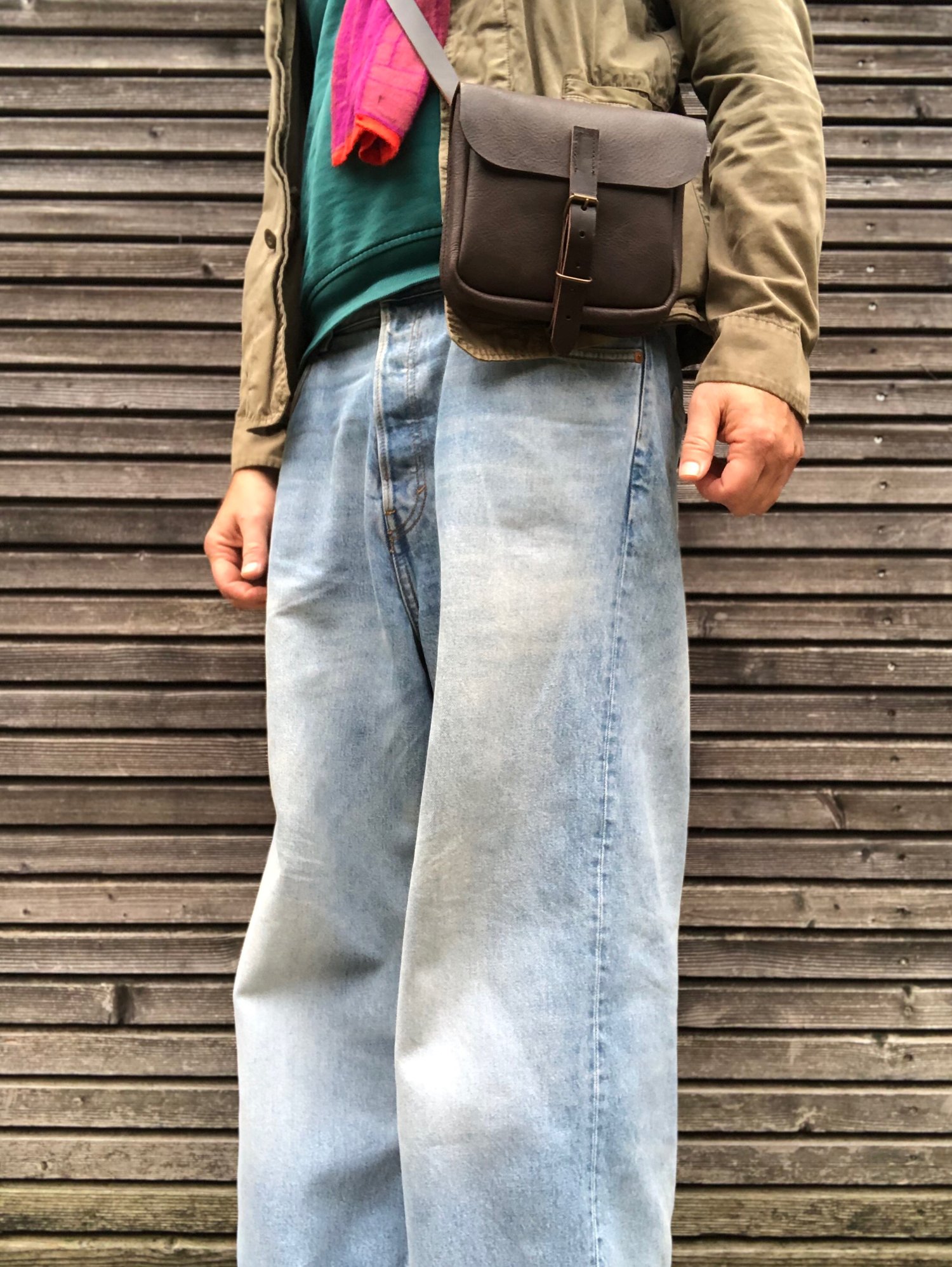 Image of Daybag in dark brown oiled leather with shoulder strap unisex collection
