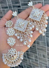 Image 2 of Kundan and pearl designer earrings and tikka set