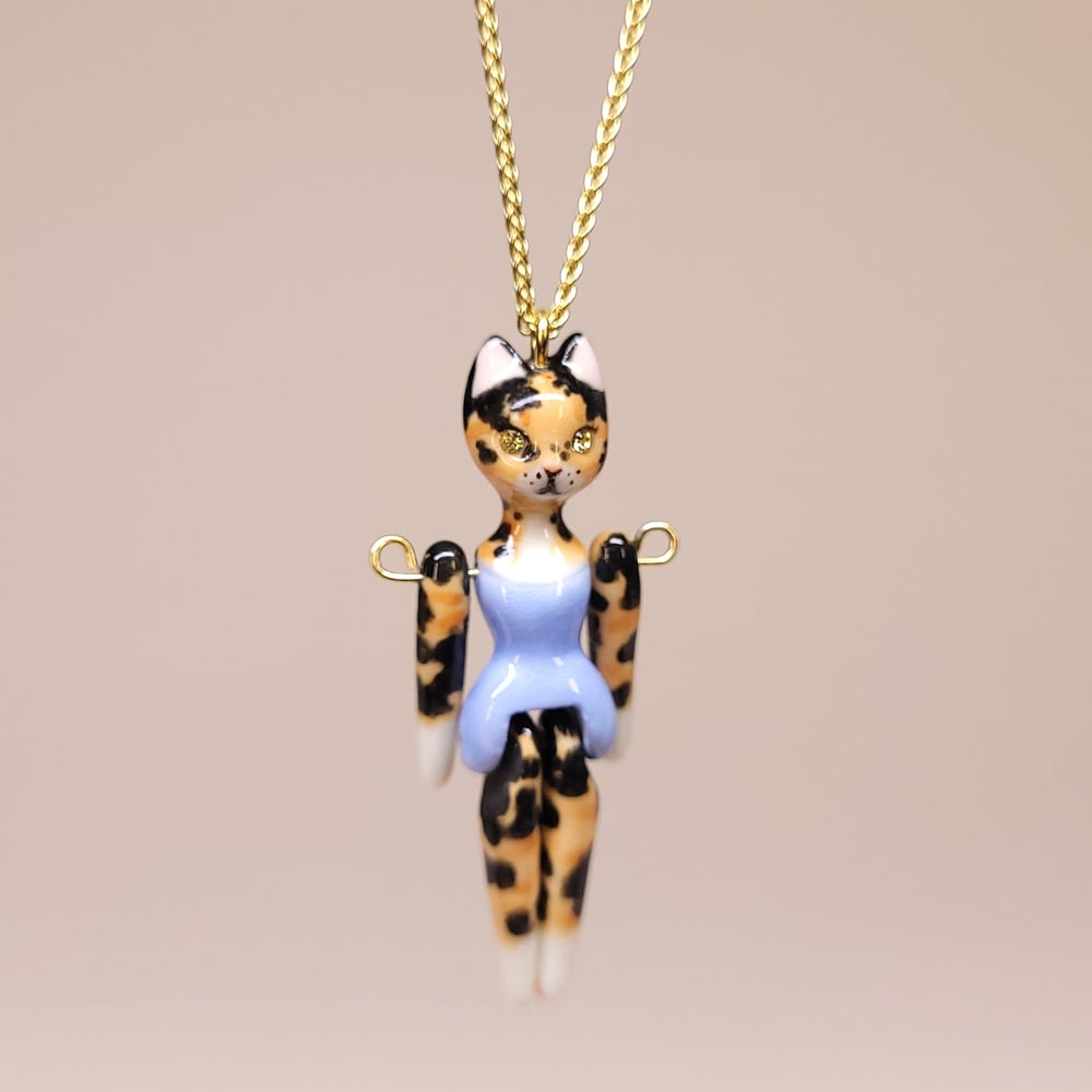 Image of Tortoiseshell Porcelain & Gold Vermeil Articulated Purrmaid Pendant