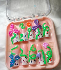 Image 1 of flower paradise press ons