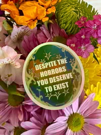 Image 2 of despite the horrors sticker