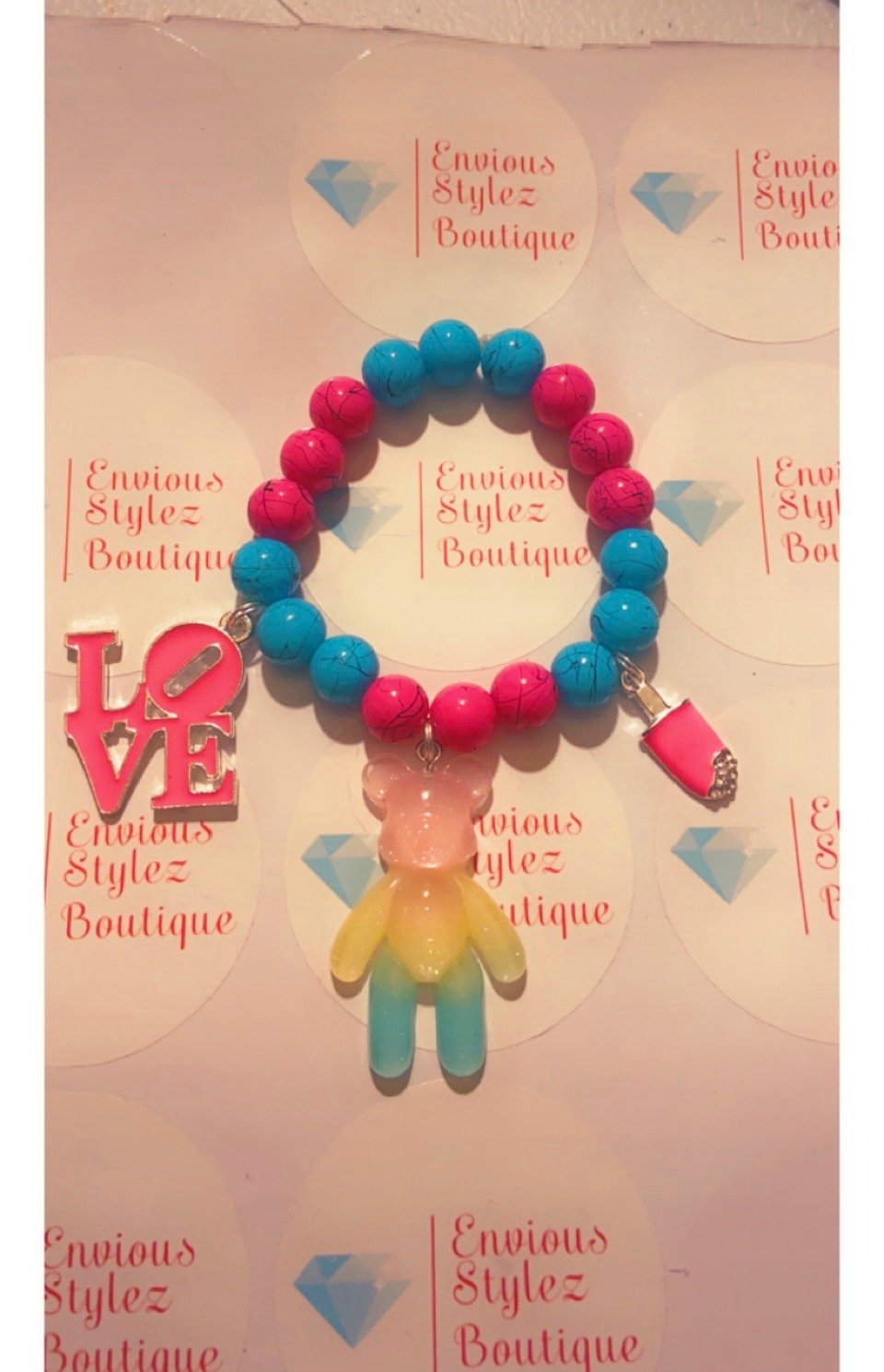 Image of Teddy bear pink and blue beaded charm bracelet 