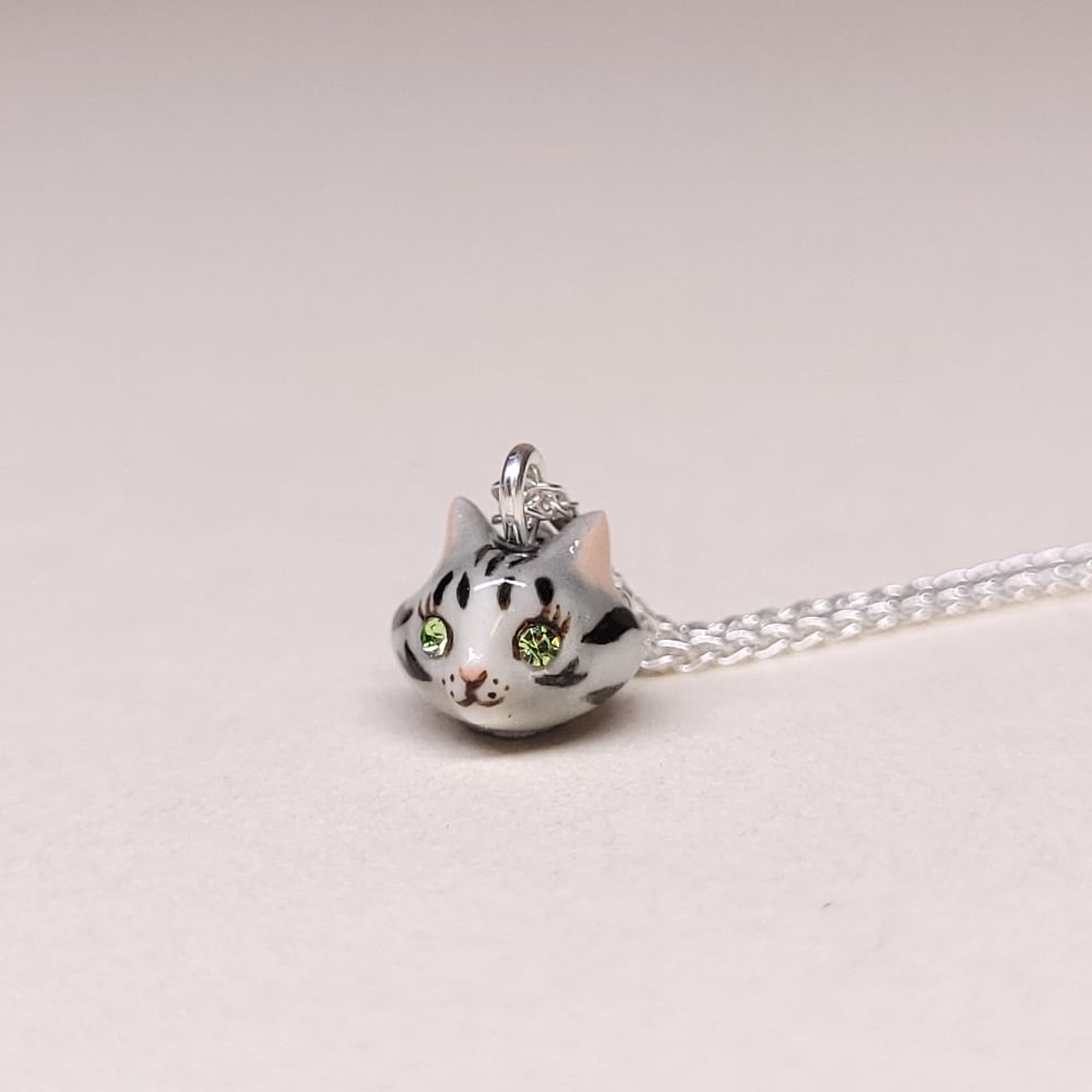 Image of Silver Tabby Porcelain & Sterling Silver Teeny Tiny Cat Pendant