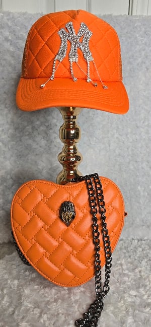 Image of Orange KG bag w/NY hat